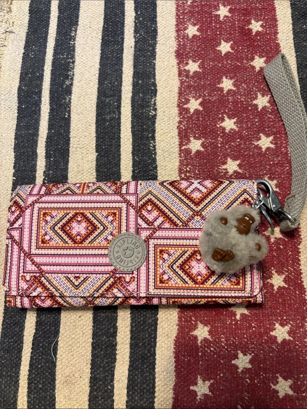 Kipling Pink and Orange Geometric Wristlet Wallet with Monkey Charm
